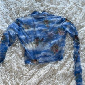 Mock neck angel print mesh crop top